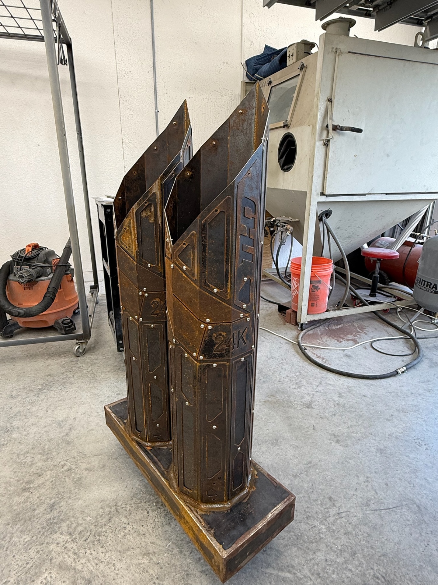 24K gold sculpture before and after powder coat 1
